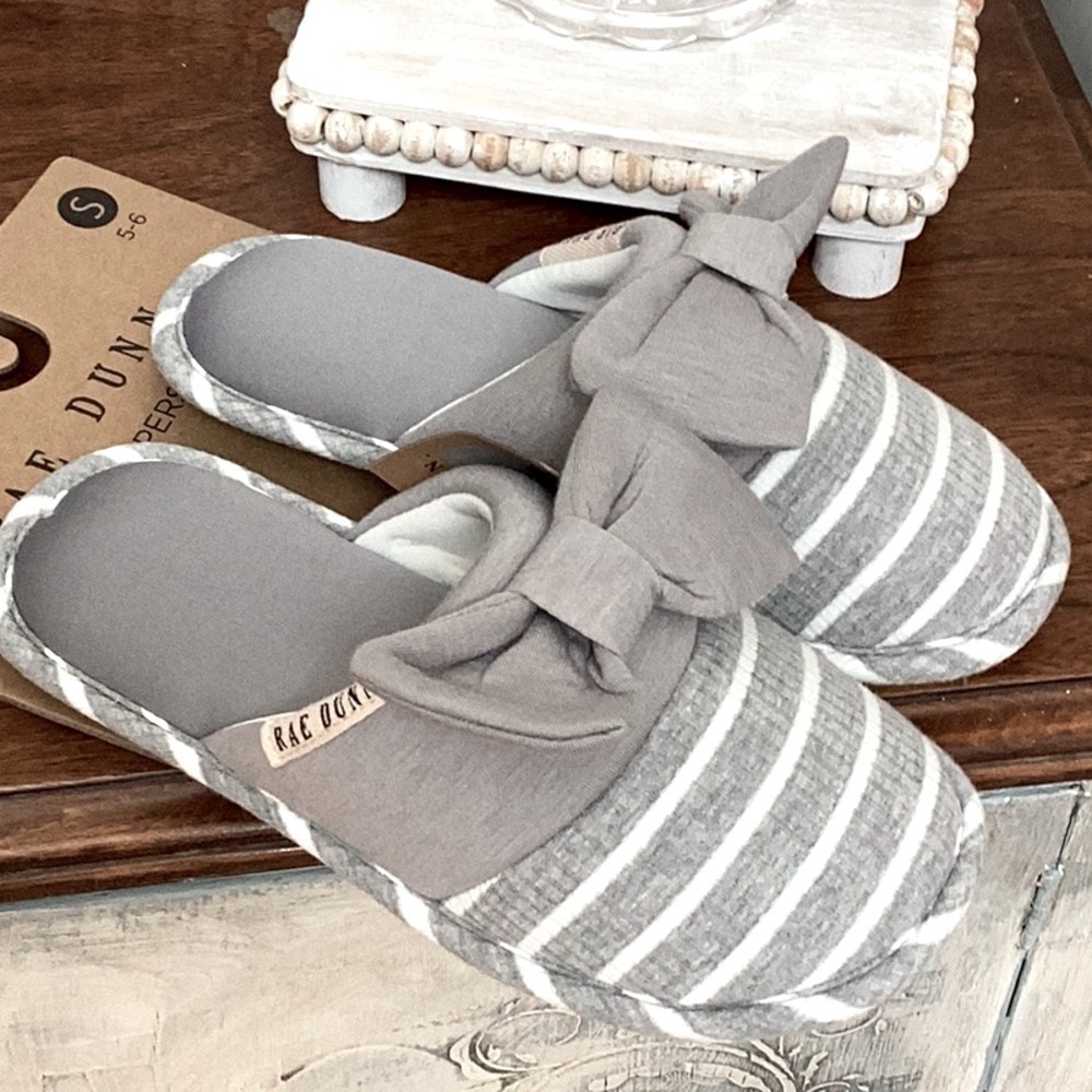 Rae Dunn gray slippers with white stripes and bow tie. NEW, women’s size S (5-6)